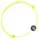 Bracelet petit satin jaune et une perle de tahiti-Bracelets perle-Marque:Référence: BRS.7-230-JAMétal: Titre: Poids du métal: Type de pierre: Perle(s) de TahitiForme - taille: Cerclée-DIAM'S- BRS.7-230-JA-DIAM'S NC