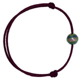 Bracelet petit satin violet une Perle de Tahiti-Bracelets perle-Marque:Référence: BRS.7-230-VIMétal: Titre: -Poids du métal: 0,02 GrType de pierre: Perle(s) de TahitiForme - taille: Cerclée-DIAM'S- -DIAM'S NC