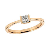 Solitaire en or jaune serti d'un diamant.